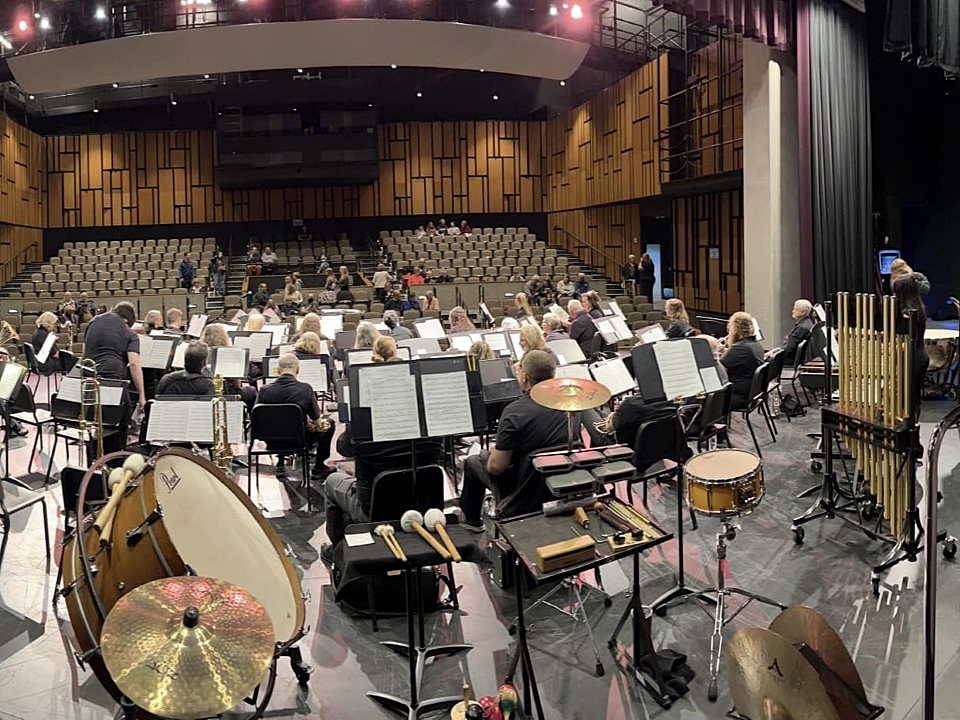 The Highline Community Symphonic Band setting up for a performance